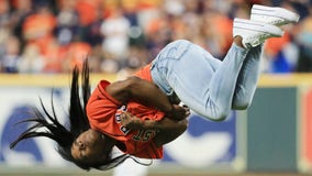 Simone Biles throws first pitch in Game 2 of the World Series, with a twist