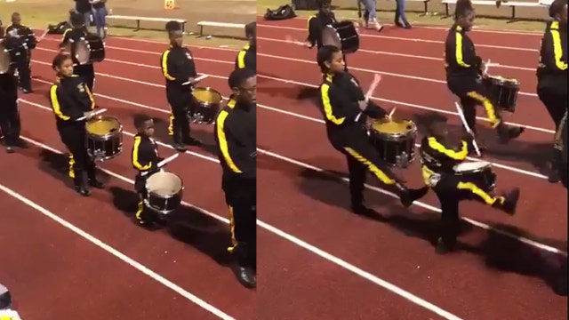 Gifted 5-year-old plays alongside high school drumline, has been with the band for two years