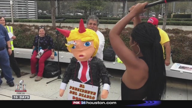 Anti-Trump protesters march in downtown Houston on Inauguration Day
