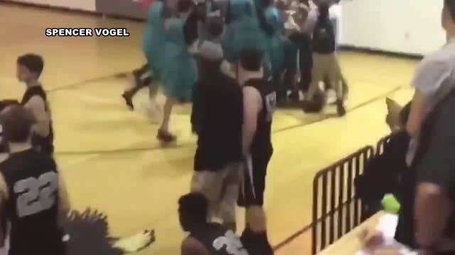 WATCH: Young basketball player without arms sinks three pointer at the buzzer