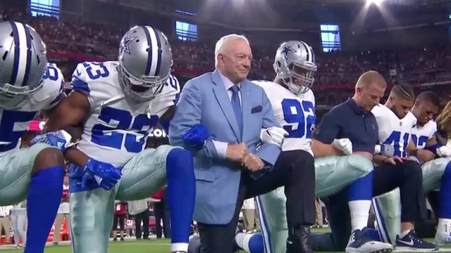 Jerry Jones kneels with Cowboys players before anthem
