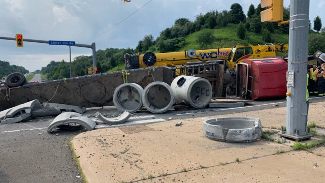 Overturned tractor trailer causing backups in Manassas