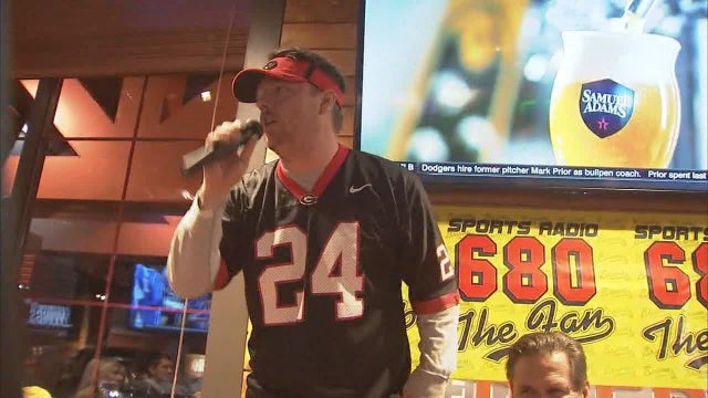 Lucky fan won tickets to UGA-Bama championship game