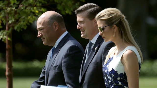 Kelly in harsh spotlight after White House senior aide's resignation