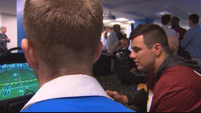 Redskins players connect with military vets in Madden NFL 16 tournament