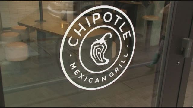 Chipotle warns of sales slide as E. coli outbreak expands