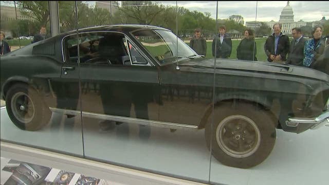 Ford Mustang driven by Steve McQueen in 1968 action film, 'Bullitt,' on display on National Mall