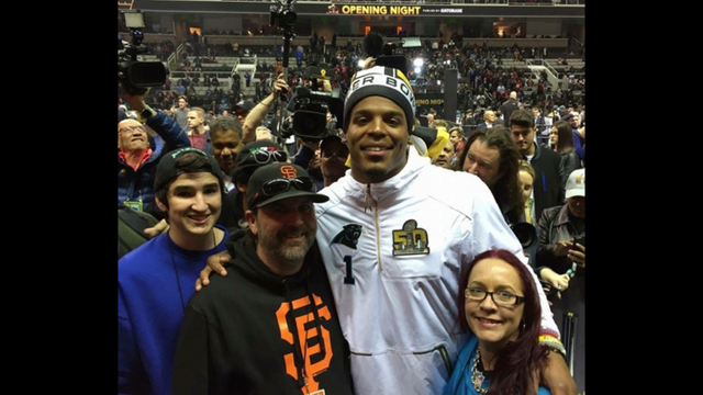 Special meeting: Cam Newton signs jersey for grieving mother