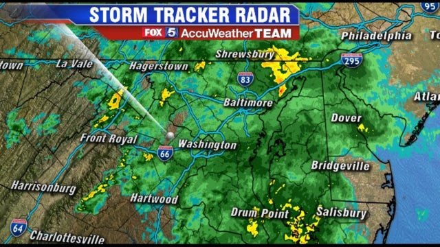 Showers continue throughout the day; sun and clouds tomorrow