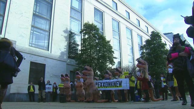 Demonstrators gather in protest of Rex Tillerson nomination hearing