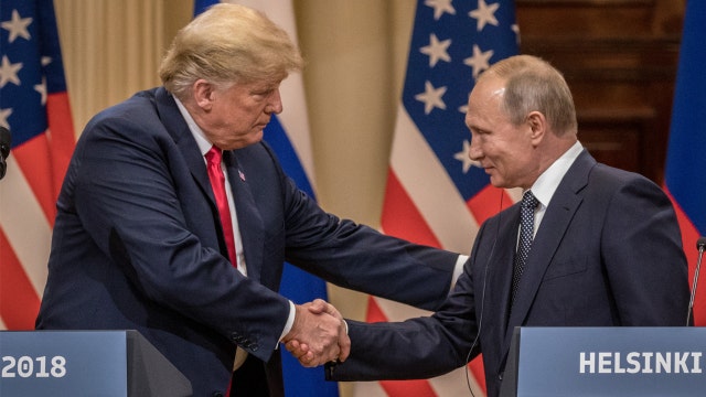 Trump embraces longtime US foe Putin, doubting own intel