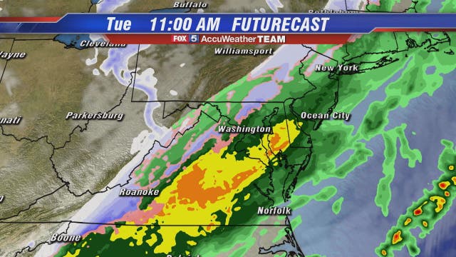 Showers end with possible wintry mix Tuesday morning; cold arctic air moves into DC region later today