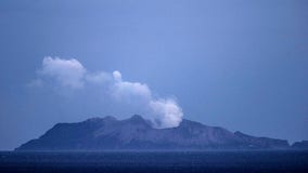 New Zealand volcano vents steam, stymies recovery of bodies