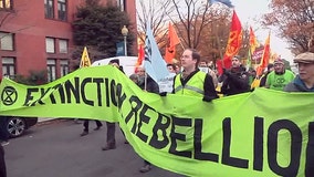 Climate change protesters march through DC streets, cause traffic gridlock