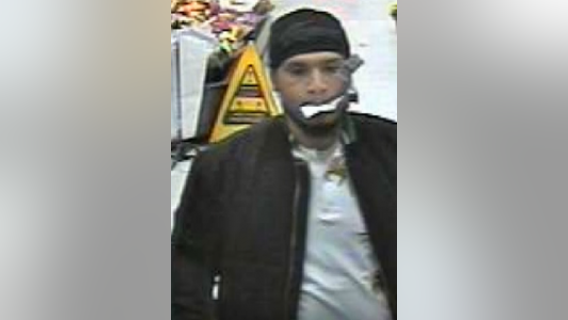 Surveillance video released of armed robbery suspect at Giant in Wheaton