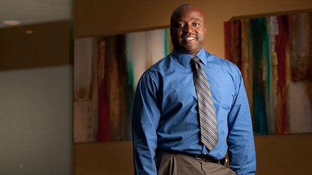 George Mason selects school's first black president