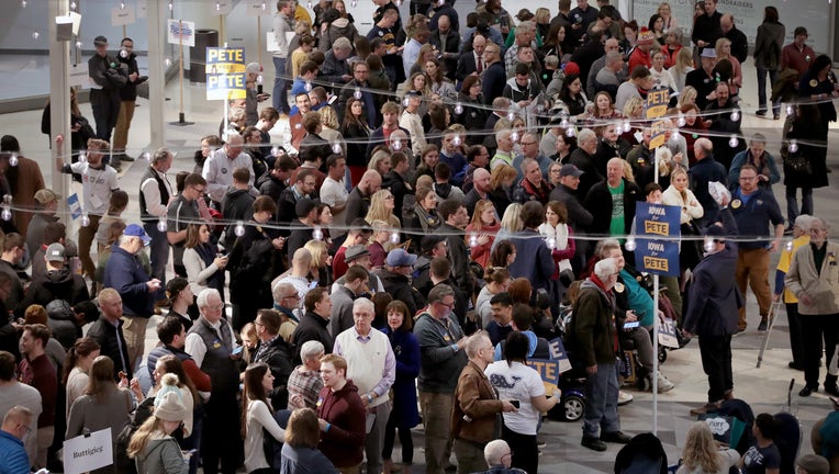 Iowa residents attend a caucus to select a Democratic nominee for president on Feb. 3, 2020 in Des Moines, Iowa.