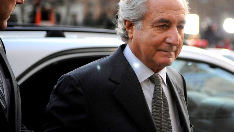 NEW YORK - MARCH 12: Financier Bernard Madoff arrives at Manhattan Federal court on March 12, 2009 in New York City. Madoff is scheduled to enter a guilty plea on 11 felony counts which under federal law can result in a sentence of about 150 years. (Photo by Stephen Chernin/Getty Images)