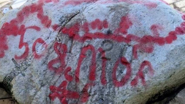 The iconic Plymouth Rock and other nearby landmarks were vandalized with red graffiti. (Kevin Depathy/GoFundMe)