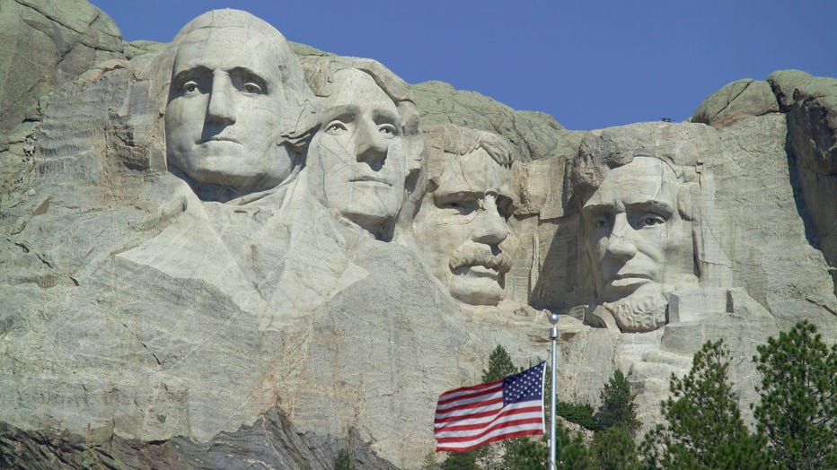 The faces of American Presidents George Washington, Thomas Jefferson, Theodore Roosevelt and Abraham Lincoln carved in the granite at Mount Rushmore National Memorial in South Dakota. (Photo credit: DEA / GIANNI OLIVA / Contributor via Getty Images)