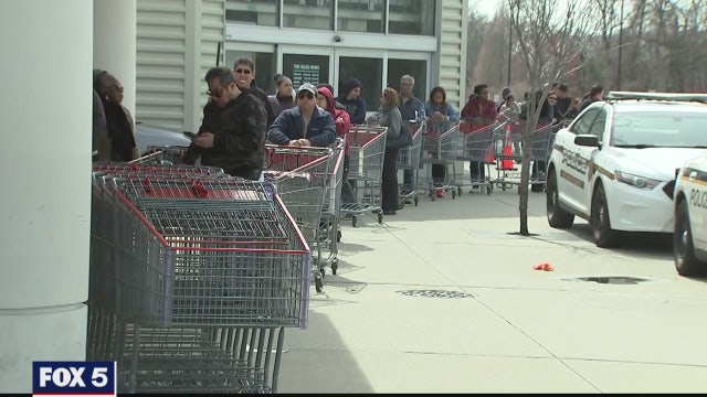 Local supermarkets struggle to meet demand as customers overrun shelves amid coronavirus threat
