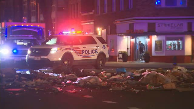 Tractor trailer carrying trash overturns on I-695, spills garbage onto DC street below