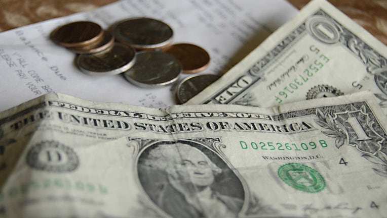 c3b16bfa-Tip money is shown in a file photo taken at a restaurant on June 7, 2012 (Photo credit: Francis Dean/Corbis via Getty Images)