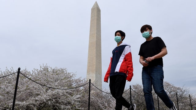 Coronavirus outbreak sparks face mask debate: Should you wear them?