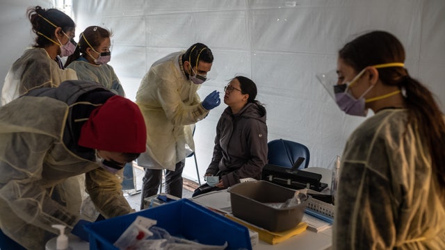 'Terrified' doctors risking their health fighting coronavirus dealt another blow - pay cuts
