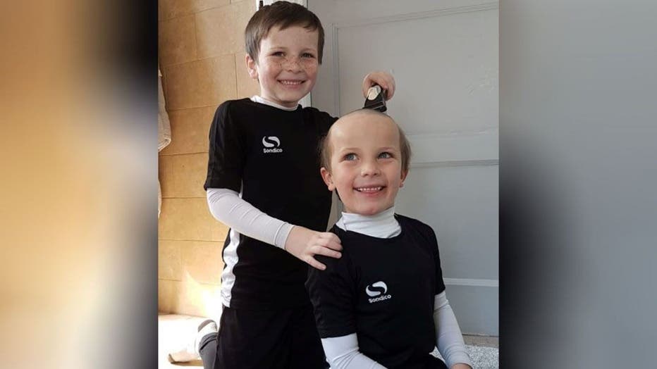 Kevin Moore says that he decided to check out what his two children, ages 5 and 7, were doing when he heard them both giggling hysterically.