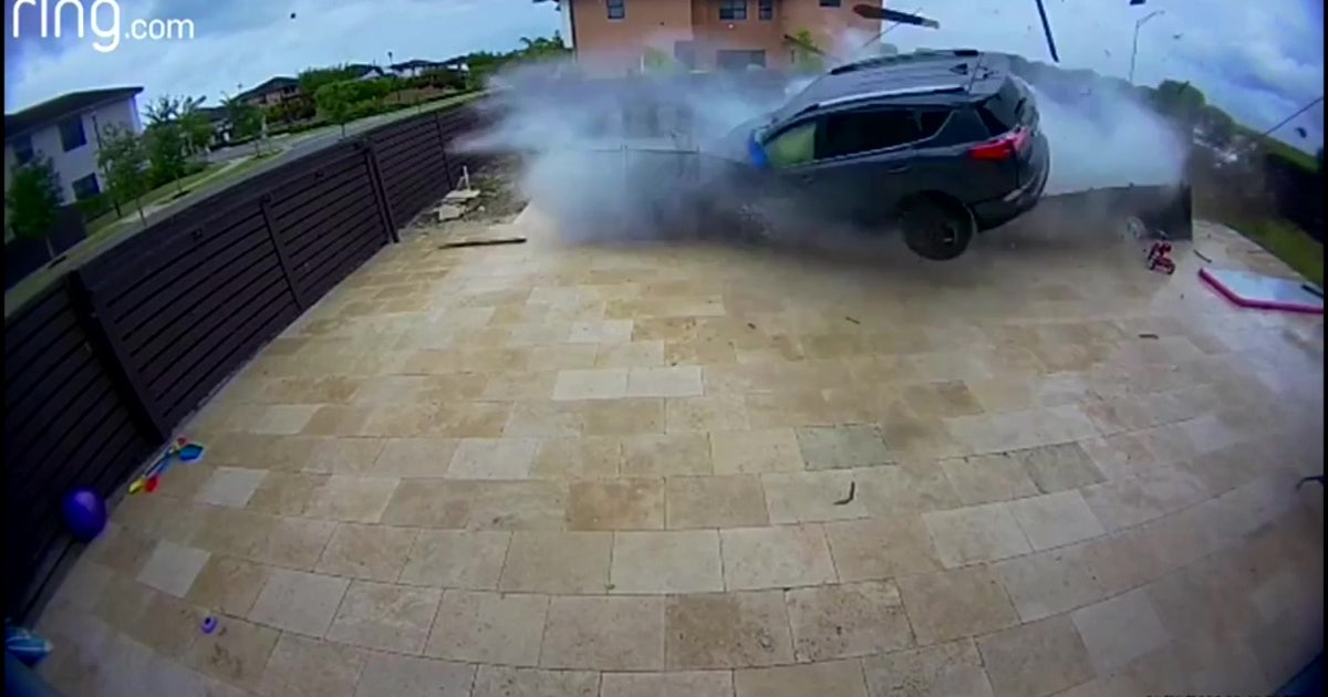 SUV crashes through South Florida backyard, flies across pool | FOX 5 DC