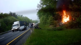 Dashcam video captures harrowing moment good Samaritan pulls passengers from fiery wreck