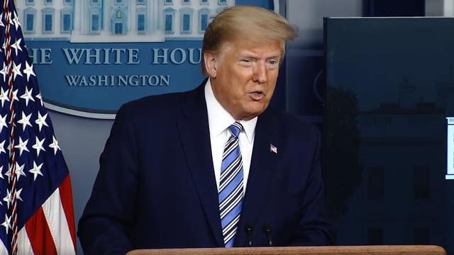 One of President Trump's personal valets tests positive for coronavirus, report says