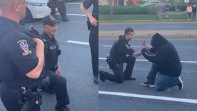 Montgomery County officers kneel in solidarity with George Floyd protesters