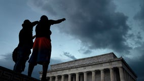Demonstrators weather the storms in DC on seventh night of protests