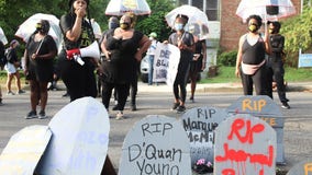 DC's black activists protest outside Vince Gray's home with police defunding calls