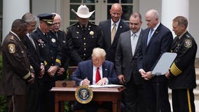 Trump signs police reform executive order in Rose Garden ceremony