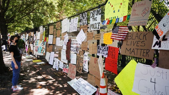 Massive fence erected around Lafayette Park becomes gallery of protest art