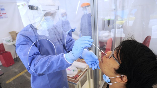 WHO says coronavirus pandemic far from over as world sees largest daily increase