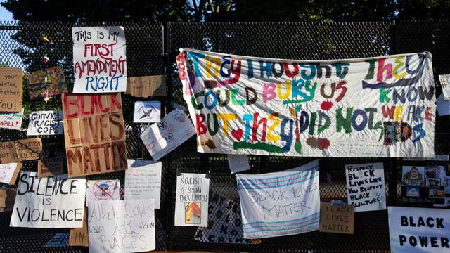 Officials back away from removing temporary fencing at White House