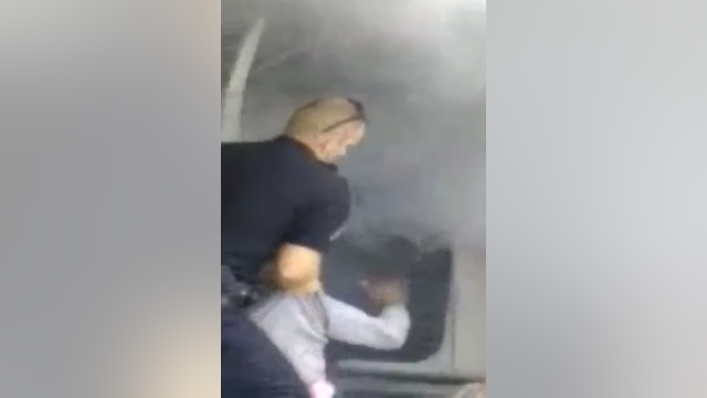 Prince George's cop pulls man from burning car in shocking cellphone video