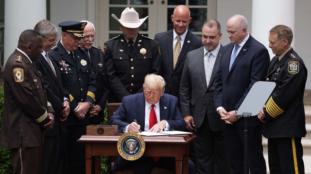 Trump signs police reform executive order in Rose Garden ceremony