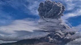 Sinabung volcano ejects towering column of ash over Indonesia