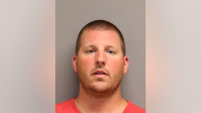 Maryland cop charged with stealing from dead person