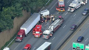 Rescue crews responding after car becomes lodged under tractor trailer on Beltway