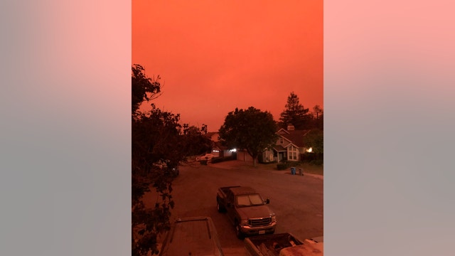 Dramatic photos: California residents wake up to raining ash and smoke-filled skies