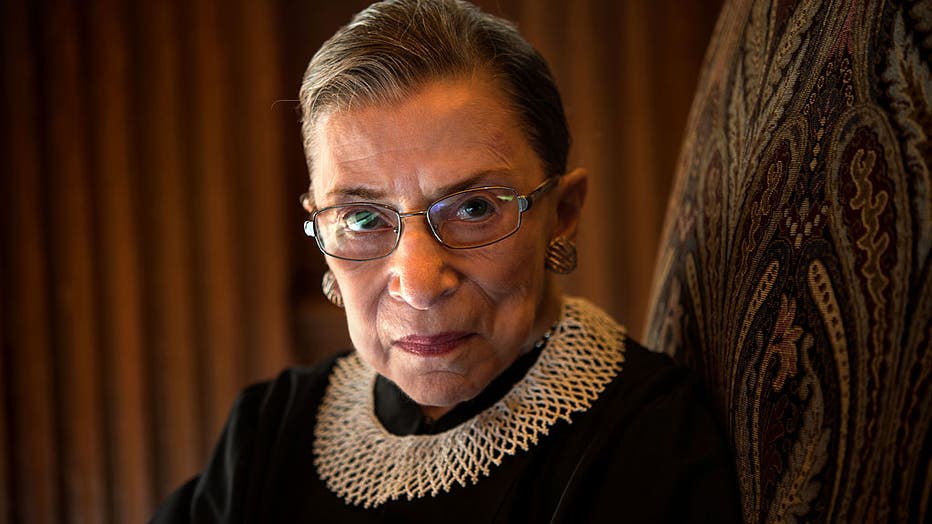 FILE - Supreme Court Justice Ruth Bader Ginsburg, celebrating her 20th anniversary on the bench, is photographed in the West conference room at the U.S. Supreme Court in Washington, D.C., on Friday, August 30, 2013.