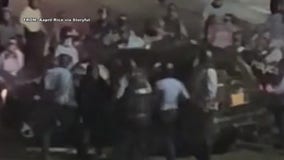 Lawyer: Mom, child trapped in crowd when police smashed car