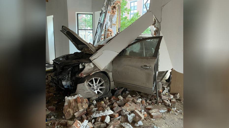 DC police and emergency crews are on the scene after a vehicle crashed into a building on H Street, Northeast.