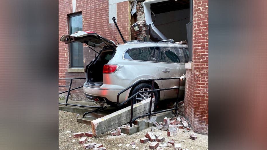 DC police and emergency crews are on the scene after a vehicle crashed into a building on H Street, Northeast.